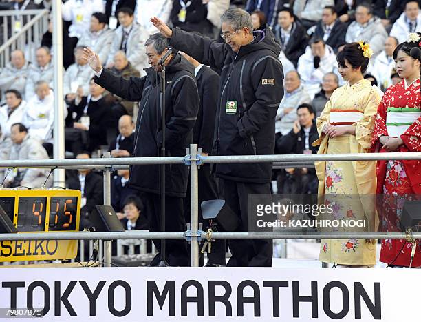 Tokyo Governor Shintaro Ishihara waves to runners during the Tokyo marathon on February 17, 2008. The main streets and highways in downtown Tokyo...