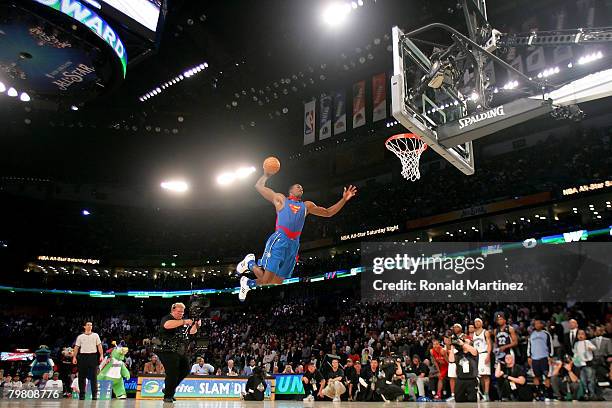 Dwight Howard of the Orlando Magic completes a dunk in the Sprite Slam Dunk Contest, part of 2008 NBA All-Star Weekend at the New Orleans Arena on...