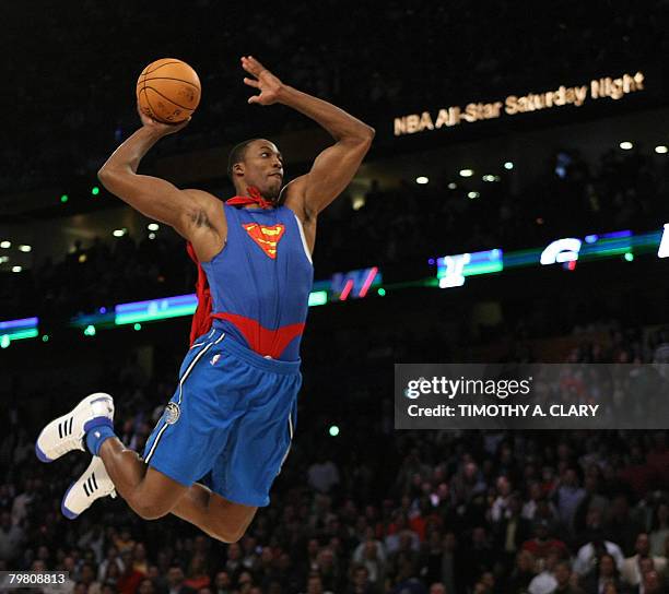 Dwight Howard of the Orlando Magic wearing a Superman cape in the Sprite Slam-Dunk Contest at the New Orleans Arena during the 2008 NBA All-Star...