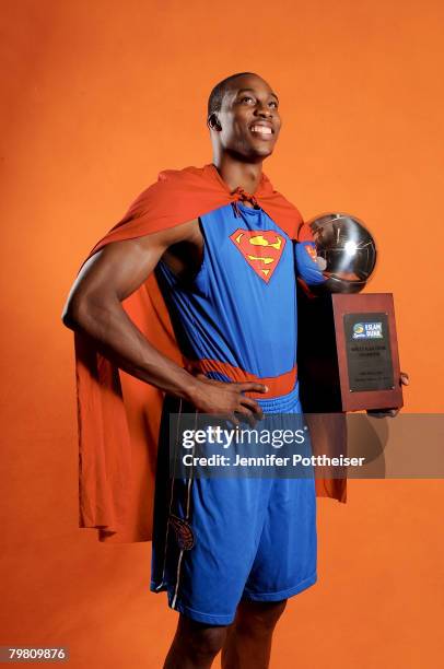 Dwight Howard of the Orlando Magic poses for a portrait with his trophy from the 2008 Sprite Dunk Contest from All-Star Saturday Night on February...