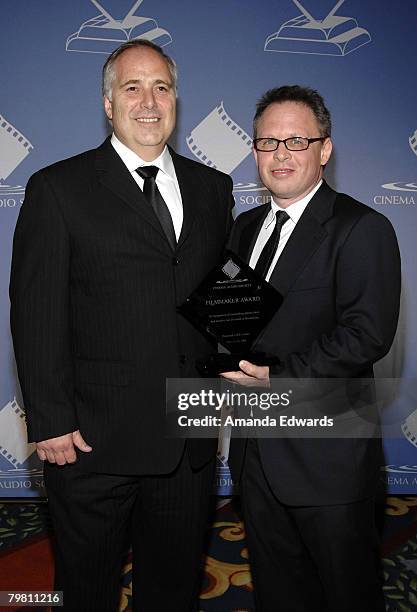 Boardmember Michael Minkler presents writer / director Bill Condon with the CAS Filmmaker Award at the 44th Annual Cinema Audio Society Awards at the...