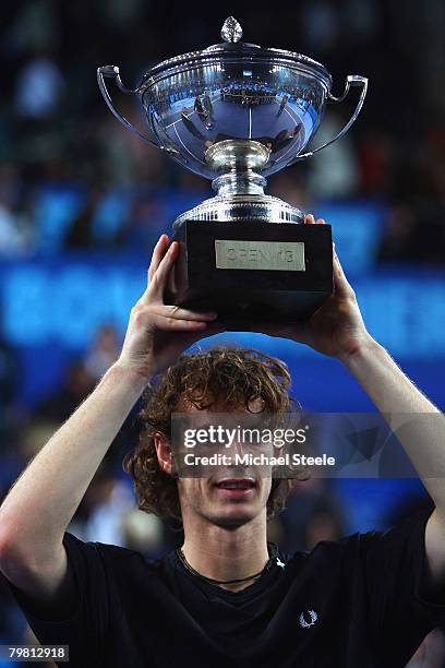 Andy Murray of Great Britain lifts the winners trophy after his 6-4, 6-3 victory in the final match against Mario Ancic of Croatia at the 2008 Open...