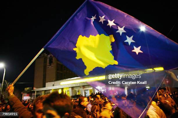 Kosovo Albanians celebrate on the day their prime minister proclaimed Kosovo "an independent, sovereign and democratic state" February 17, 2008 in...