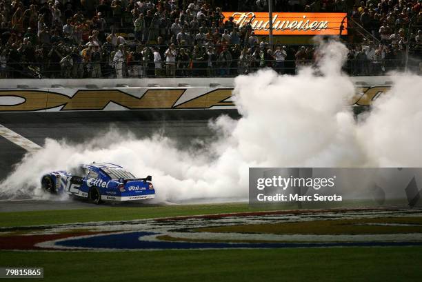 Ryan Newman, driver of the Alltel Dodge, does a burnout after winning the 50th NASCAR Sprint Cup Series Daytona 500 at Daytona International Speedway...