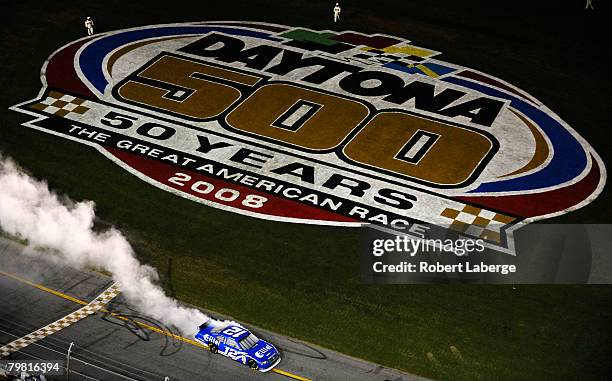 Ryan Newman, driver of the Alltel Dodge, does a burnout after winning the 50th NASCAR Sprint Cup Series Daytona 500 at Daytona International Speedway...