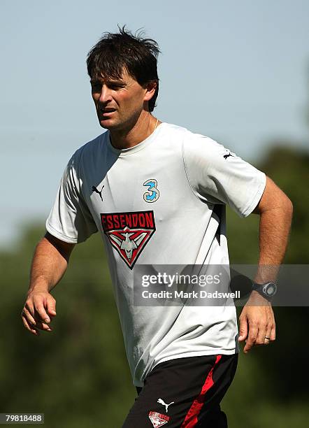 Ashley Prescott, assistant coach of the Bombers, instructs his players during an Essendon Football Club training session held at Windy Hill February...