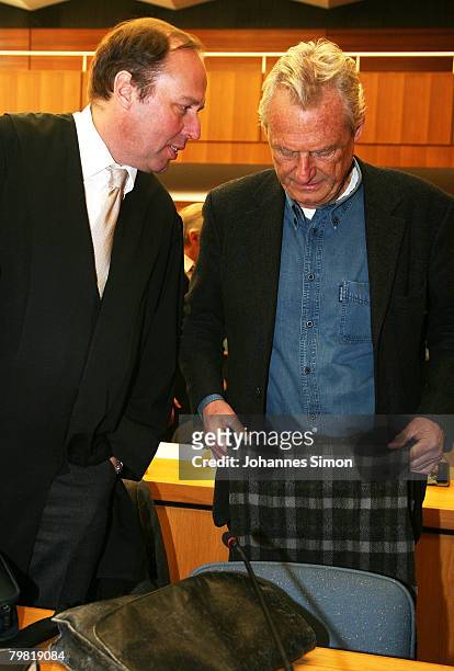 Defendant architect Rolf Reichert and his lawyer Thomas Pfister wait for the opening of the third day of the Bad Reichenhall ice rink trial at court...