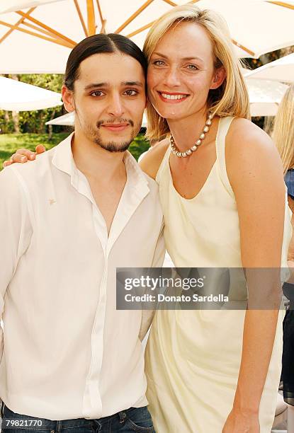 Actress Amber Valletta and Nina Ricci designer Oliver Theyskens inside the "Couture Cares" exclusive Nina Ricci fashion show and luncheon to benefit...