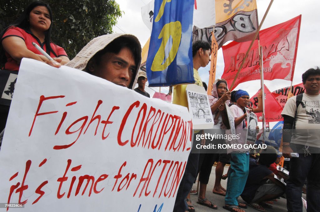 Anti-Arroyo protestors rally outside the