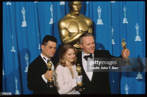 Best Actor recipient Anthony Hopkins, Best Actress recipient Jodie Foster and Best Director recipient Jonathan Demme hold their Oscars at the 64th...