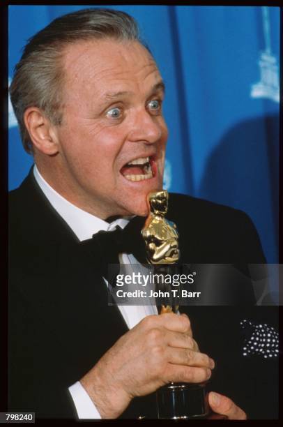 Best Actor recipient Anthony Hopkins displays his Oscar at the 64th annual Academy Awards March 30, 1992 in Los Angeles, CA. The Academy of Motion...