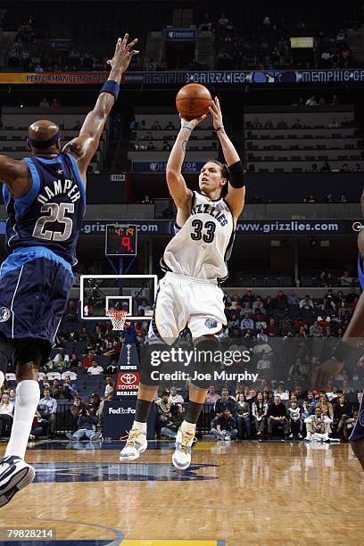 Mike Miller of the Memphis Grizzlies goes up for the shot during the NBA game against the Dallas Mavericks at the FedExForum on January 28, 2008 in...