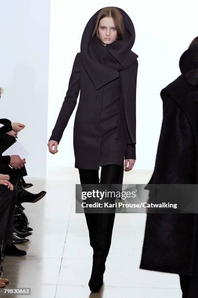 Model walks the runway wearing the Jill Sander Fall/Winter 2008/2009 collection during Milan Fashion Week on the 18th of February 2008 in Milan,...