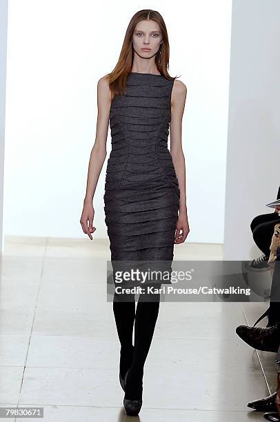 Model walks the runway wearing the Jill Sander Fall/Winter 2008/2009 collection during Milan Fashion Week on the 18th of February 2008 in Milan,...