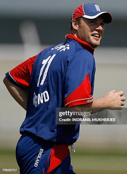 England cricketer Andrew Flintoff smiles after fielding a ball during the match between England Lions and Mumbai XI cricket teams at the Brabourne...
