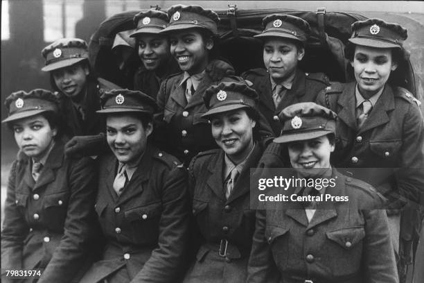 Group of West Indian ATS recruits arrive at camp in an army car, November 1943.