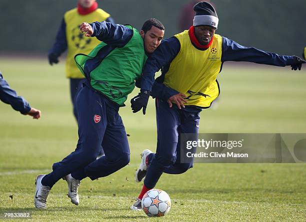 Theo Walcott and William Gallas in action during an Arsenal training session at London Colney Training Ground on February 19, 2008 in London, England.