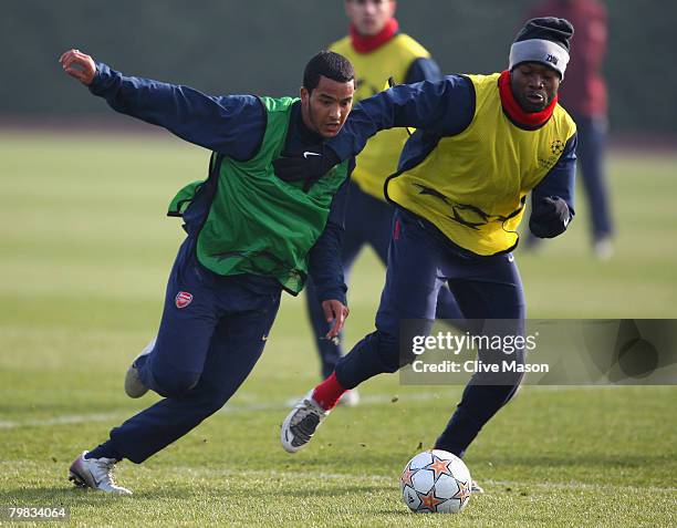 Theo Walcott and William Gallas in action during an Arsenal training session at London Colney Training Ground on February 19, 2008 in London, England.