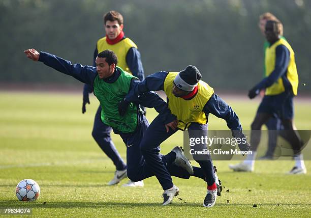 Theo Walcott and William Gallas in action during an Arsenal training session at London Colney Training Ground on February 19, 2008 in London, England.