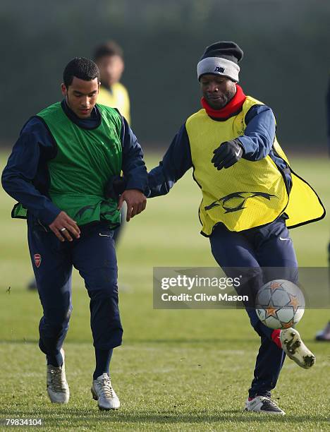 Theo Walcott and William Gallas in action during an Arsenal training session at London Colney Training Ground on February 19, 2008 in London, England.