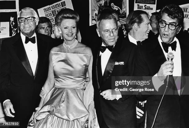 Actors Cary Grant, Dina Merrill, Milton Berle and Dean Martin flank Frank Sinatra at a 1979 Las Vegas, Nevada, party honoring Frank Sinatra.