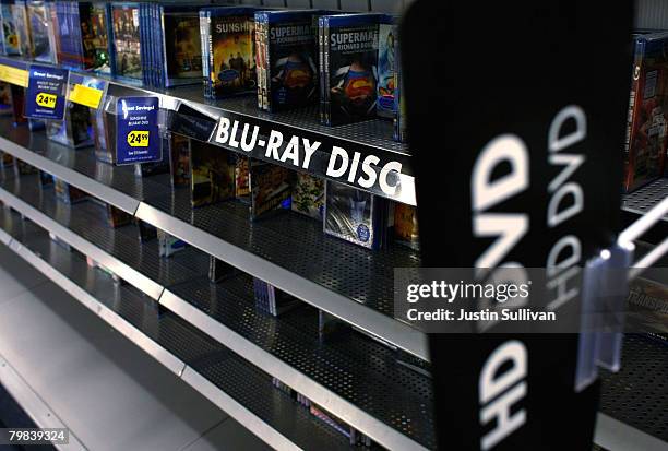 Blu-ray discs are seen next to HD DVD's on a shelf at a Best Buy store February 19, 2008 in San Francisco, California. Toshiba Corp. Announced today...