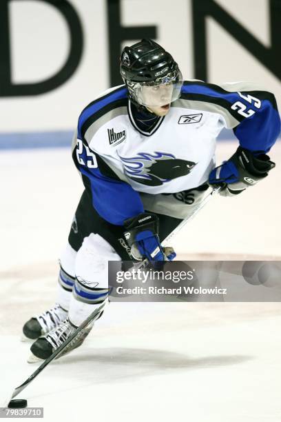 Chris DiDomenico of the Saint John Sea Dogs skates with the puck during the game against the Drummondville Voltigeurs at the Centre Marcel Dionne on...