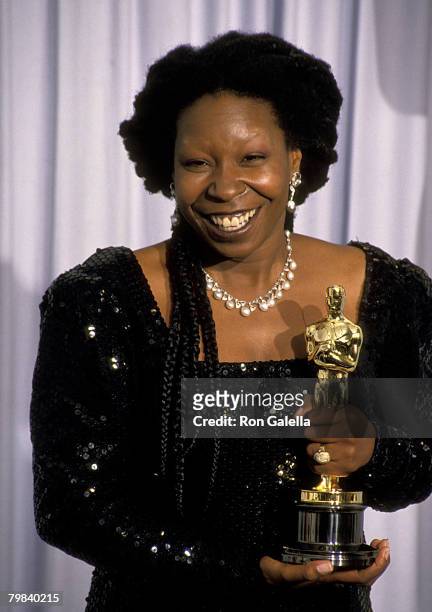 American actress, Whoopi Goldberg, with her Oscar for Best Supporting Actress, at the 63rd Annual Academy Awards at the Shrine Auditorium in Los...