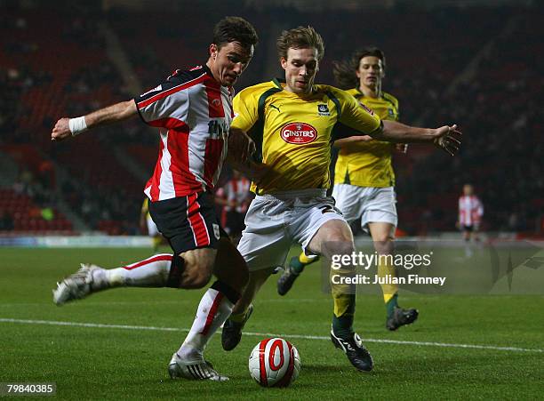 Marek Saganowski of Southampton battles with Russell Anderson of Plymouth during the Coca- Cola Championship match between Southampton and Plymouth...
