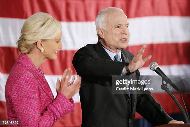 Republican presidential hopeful Sen. John McCain speaks while wife Cindy looks on during a campaign rally at the Hayes Grand Ballroom February 19,...