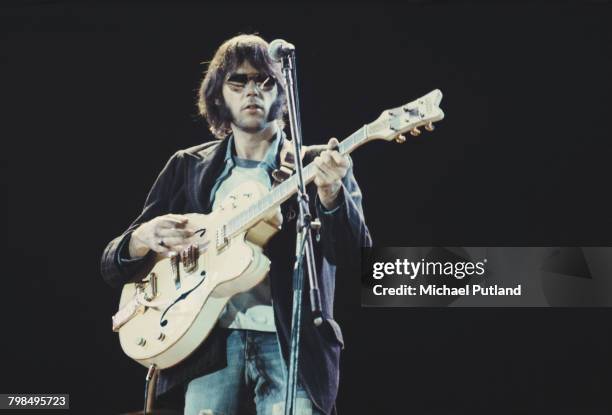 Canadian musician Neil Young of Crosby, Stills, Nash And Young performs on stage at Wembley Stadium, London on September 14th 1974.