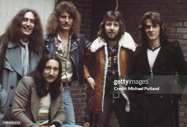 English rock group Uriah Heep posed together in London in 1975. The band members are, from left to right, Ken Hensley, Mick Box , David Byron, Lee...