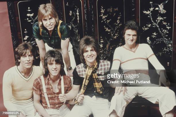 Scottish pop group The Bay City Rollers posed together in 1974. The band are, from left to right: Alan Longmuir, Derek Longmuir , Stuart 'Woody'...