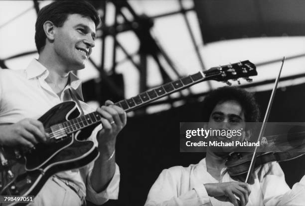 English guitarist and composer John McLaughlin performing with the One Truth Band at the Dr Pepper Music festival in Central Park, Manhattan, New...