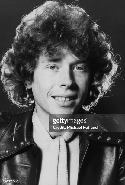 English musician and guitarist Rob Davis of British glam rock group Mud posed wearing a leather jacket in England on 19th September 1975.