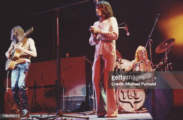 From left, guitarist Steve Howe, singer Jon Anderson and drummer Bill Bruford performing with English progressive rock group Yes at the Rainbow...