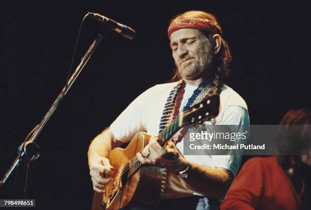 American singer, songwriter and musician, Willie Nelson performs live on stage in New York in December 1980.