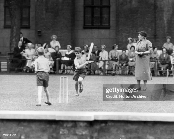 Prince Charles plays cricket at the Hill House School Field Day in Chelsea, 8th July 1957.