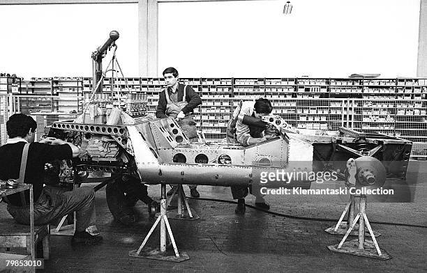 Mechanics building up the prototype P400 Miura at the Lamborghini Factory in Sant'Agata, October 1965.