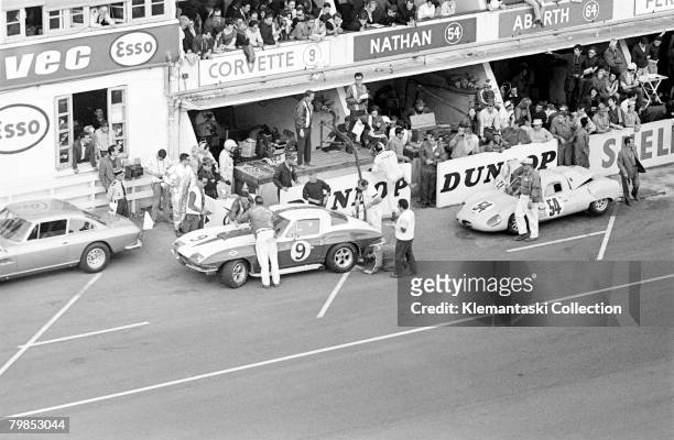 Pit stop action for the Dana Chevrolet-entered Corvette driven by Bob Bondurant and Dick Gullstrand, during the The 24 Hours of Le Mans race, June...