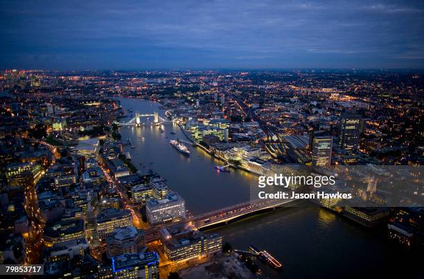 Aerial night view of Tower Bridge and London Bridge on August 6, 2007 in London.