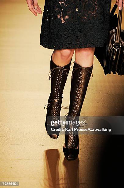 Model walks the runway wearing the Prada Fall/Winter 2008/2009 collection during Milan Fashion Week on the 19th of February 2008 in Milan, Italy.