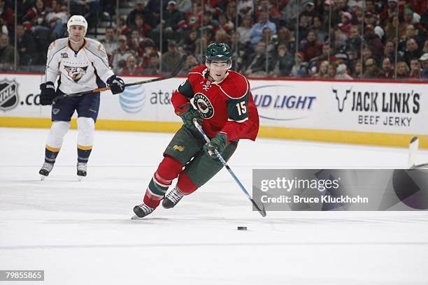 James Sheppard of the Minnesota Wild skates with the puck against the Nashville Predators during the game at Xcel Energy Center on February 17, 2008...