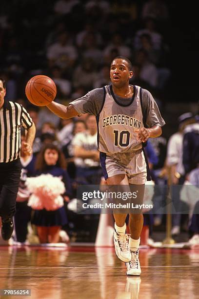 David Edwards of the Georgetown Hoyas dribbles up court during a basketball game at Capital Centre on February 8, 1990 in Landover, Maryland.