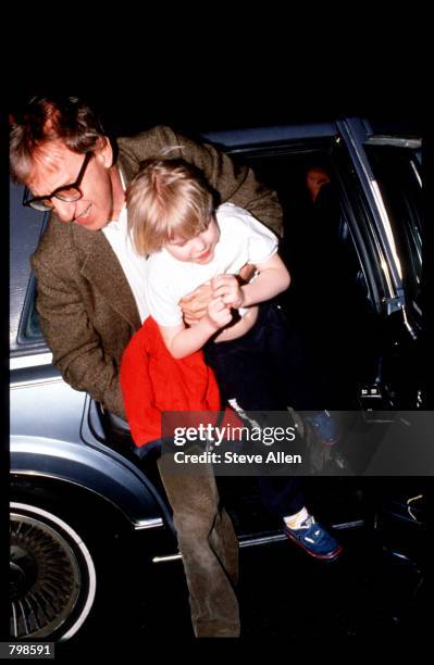 Director Woody Allen takes his son Satchel home April 10, 1993 in New York City. Allen's ex-girlfriend Mia Farrow is filing for custody of their...