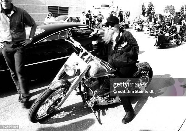 Billy Gibbons of the rock band ZZ Top rides his custom Harley Davidson motorcycle at the Harley Davidson 90th Reunion in Milkaukee Wisconsin on June...