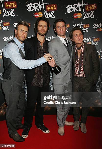 Take That pose with the award for Best British Live Act during the Brit Awards 2008 at Earls Court on February 20, 2008 in London, England.