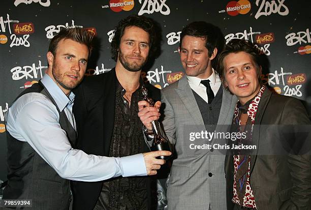 Take That pose with the award for Best British Live Act during the Brit Awards 2008 at Earls Court on February 20, 2008 in London, England.