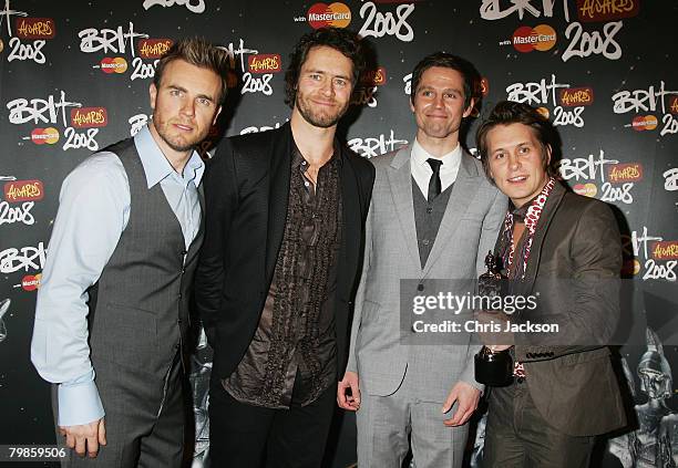 Take That pose with the award for Best British Live Act during the Brit Awards 2008 at Earls Court on February 20, 2008 in London, England.