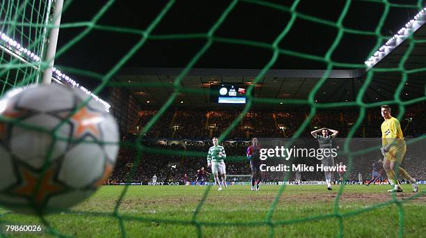 Celtic's goalkeeper Artur Boruc watches the ball hit the back of the net as a goal is scored by Thierry Henry of Barcelona during the UEFA Champions...